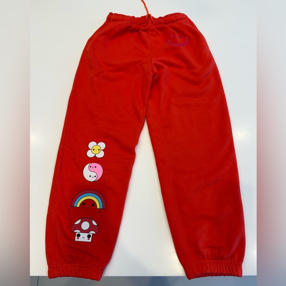 Orange women’s size large double pocket sweatpants with drawstring